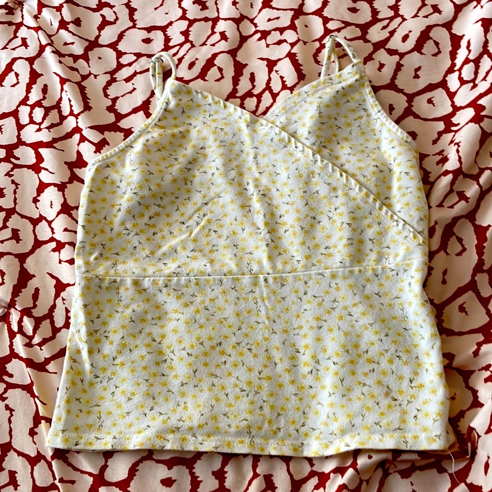 Purple shirt white white flowers Yellow shirt with yellow flowers